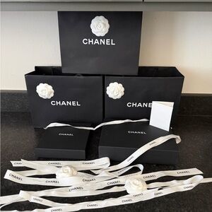 CHANEL Black and White Gift Bags with Camellia Accents